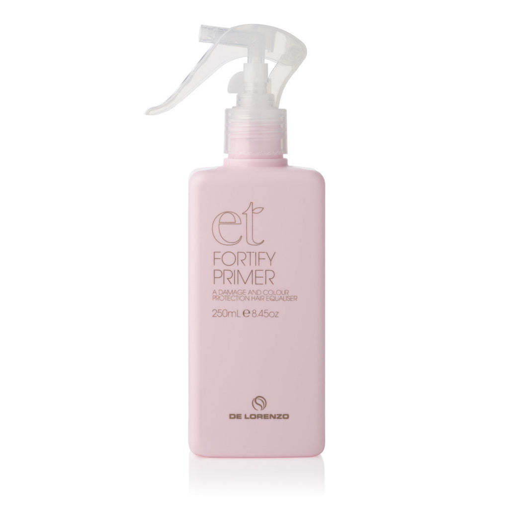 De Lorenzo Essential Treatments Fortify Primer 250ml bottle, featuring a lightweight, nutrient-rich formula designed to repair, strengthen, and smooth damaged or fragile hair for a polished, healthy finish. Salon Essentials