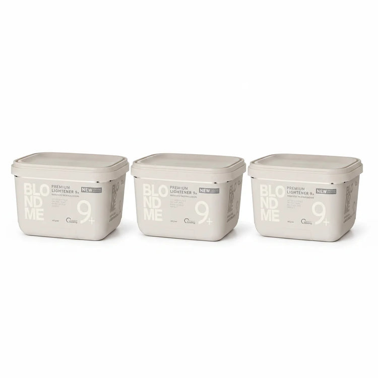 Three rectangular plastic containers of BLOOM ME 9+ Premium Lightener in a light beige color, arranged side-by-side on a white background.