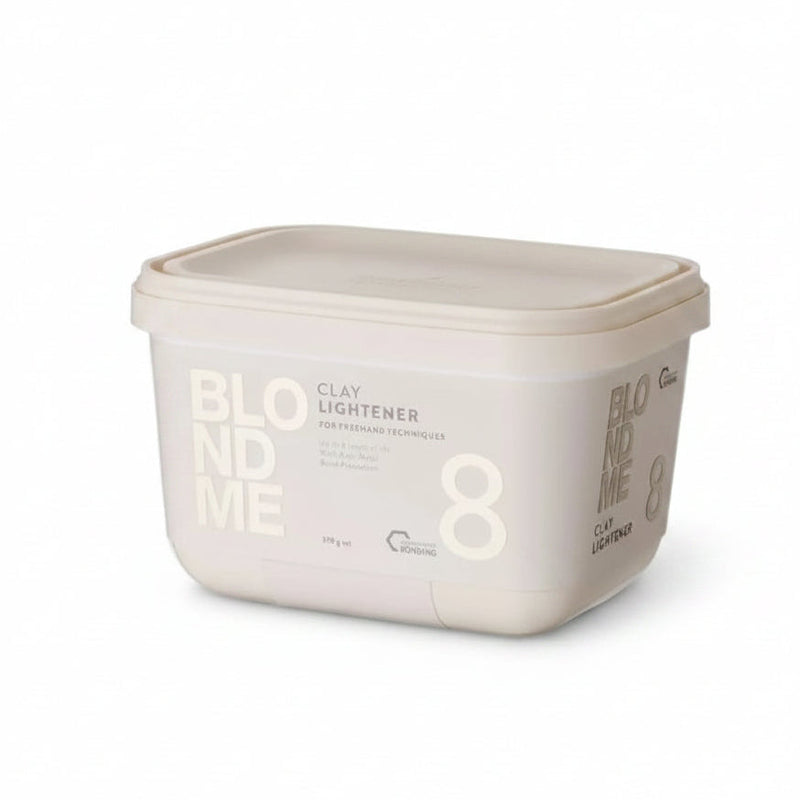 A rectangular plastic tub of BlondMe Clay Lightener in shade 8, shown on a plain white background.