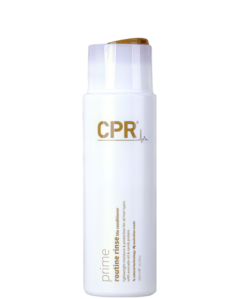 CPR Prime Essentials Rinse Lite Conditioner 900ml bottle standing upright, featuring a sleek white design with modern text, placed against a clean background, highlighting its professional-grade haircare branding
