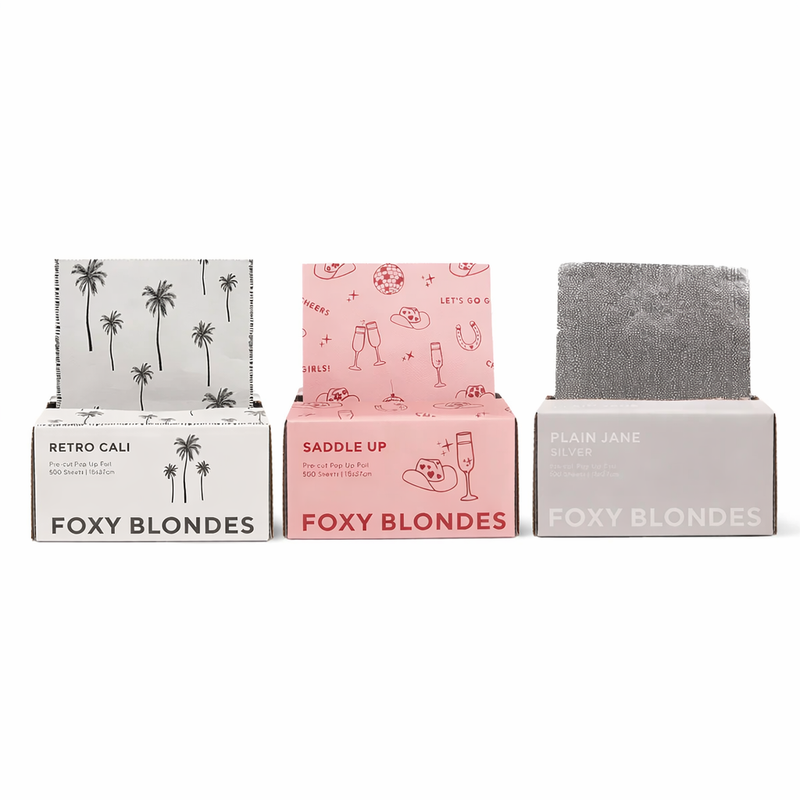 Foxy Blondes product packaging with various designs on a white background