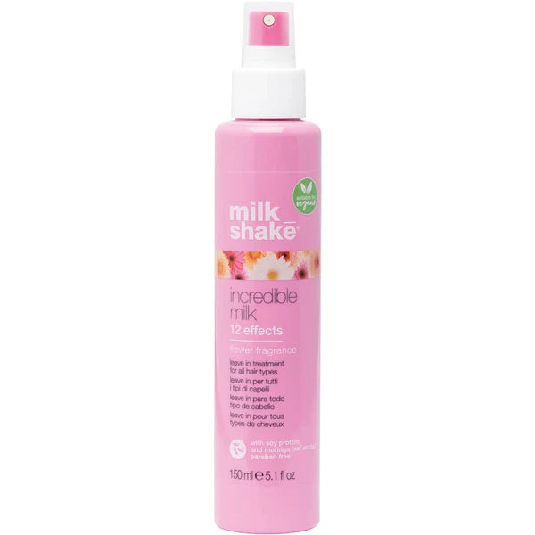 Pink spray bottle with 'milk shake' branding on a white background