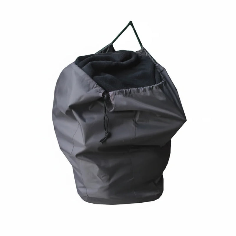 Black trash bag with a handle on a white background