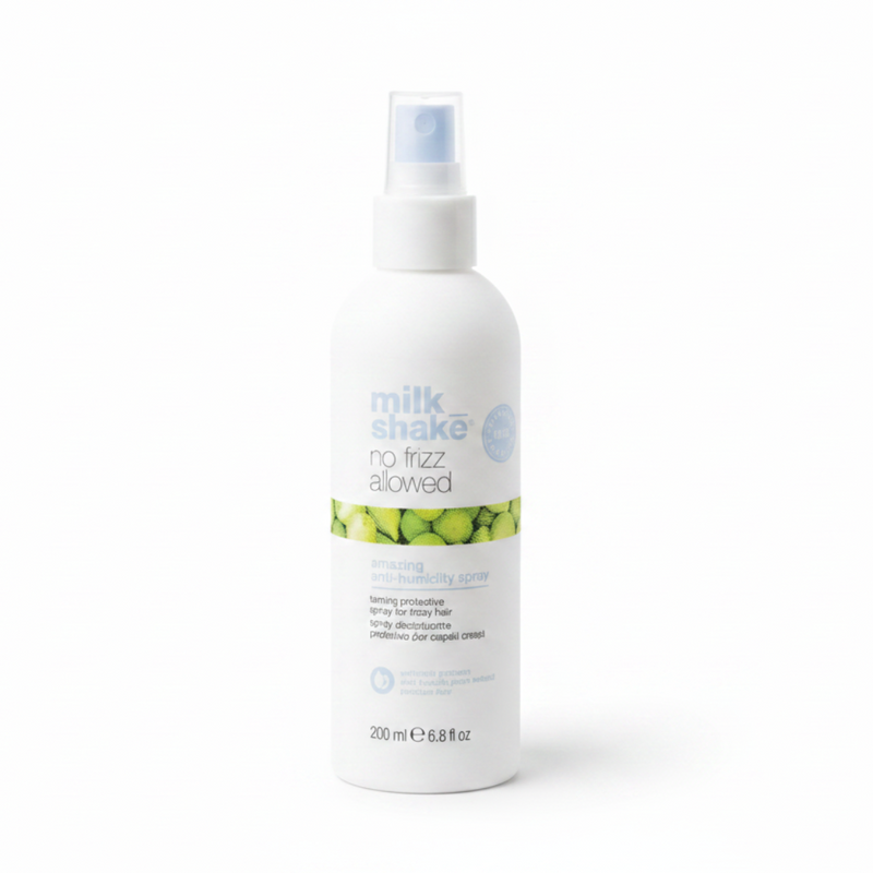Milk Shake anti humidity hair product spray bottle on a white background