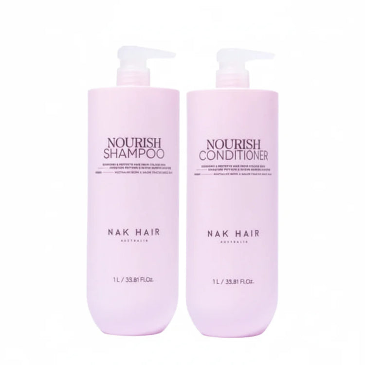 Two bottles of NAK Hair Nourish Shampoo and Conditioner on a white background
