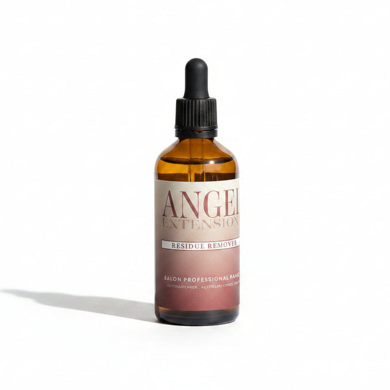 Brown bottle with dropper labeled 'Angel Extensions' on a light surface.