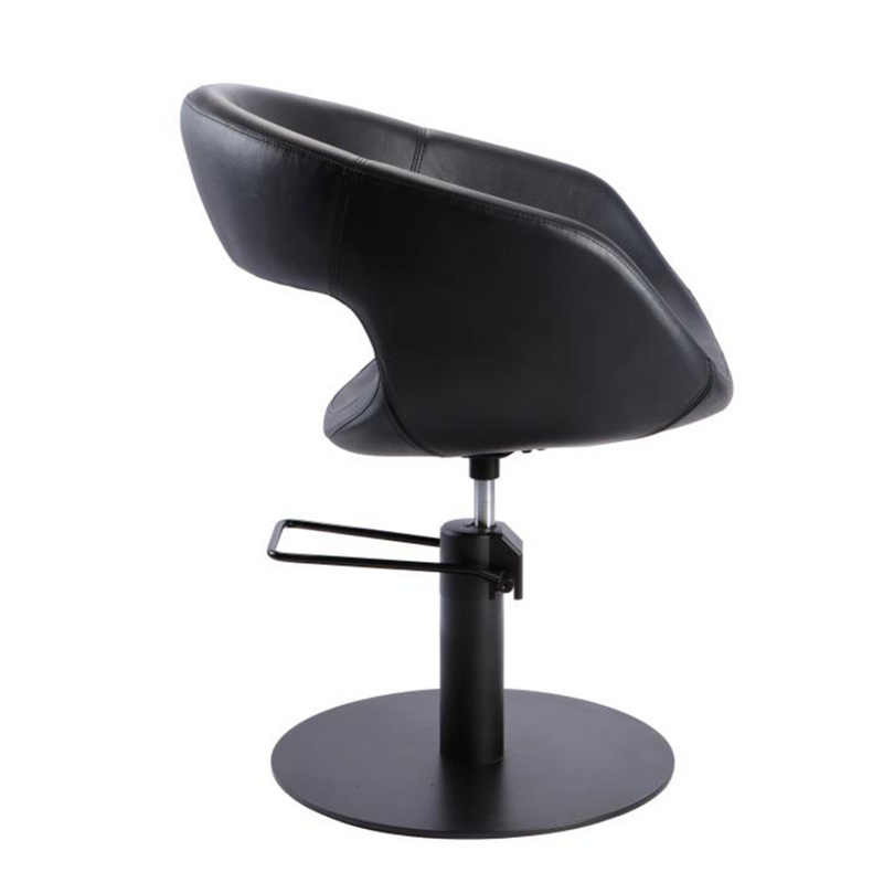 Black salon chair with adjustable height on a white background