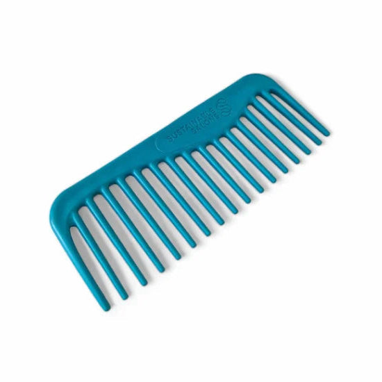 Blue comb on a white background