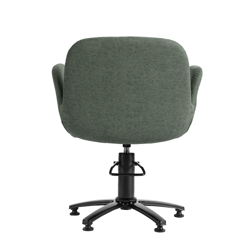 A modern upholstered salon chair with a rounded, high-back seat in textured sage green fabric, featuring integrated armrests, a black gas-lift swivel base, and five black caster wheels, shown against a plain white background.