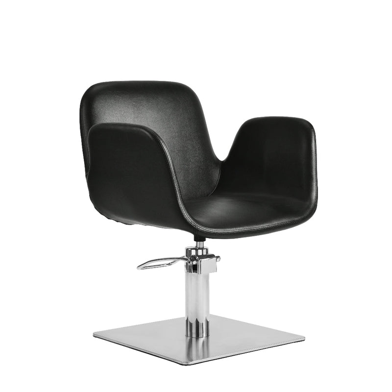 A modern black salon chair with a curved backrest and seat, mounted on a chrome hydraulic lift post with a square base, shown against a plain white background.