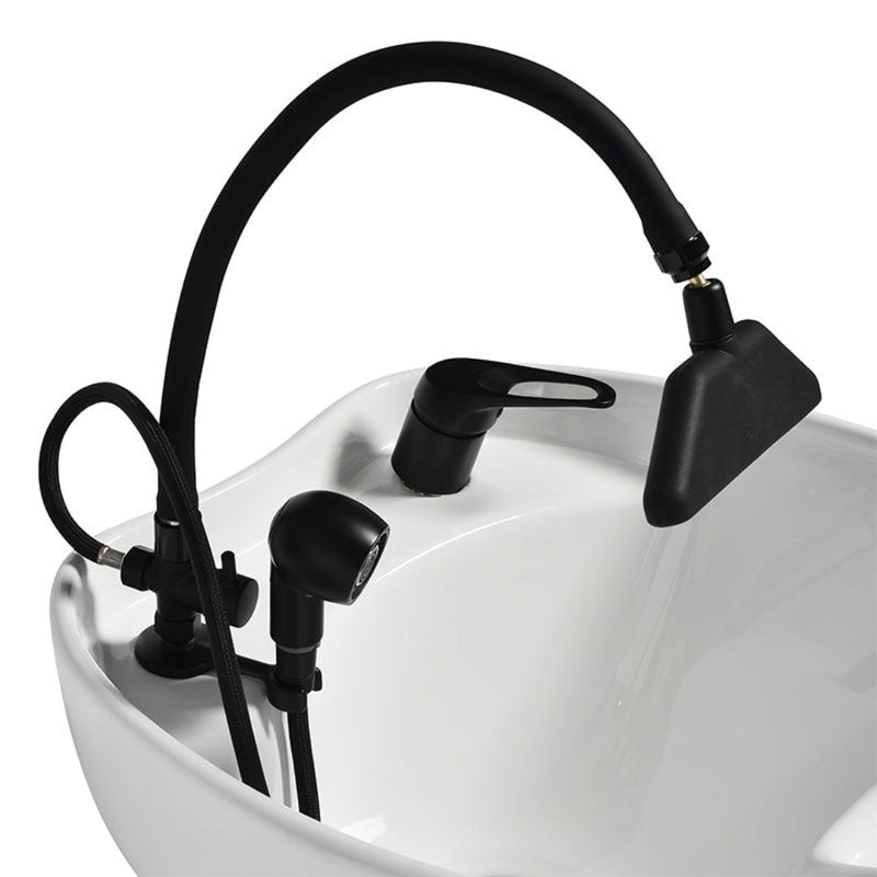 A Salon Waterfall Head Spa Black faucet with spray head on a white sink